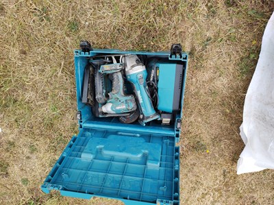Lot 474 - 6 Items - Makita battery charger, battery, drill, impact driver, angle grinder, chainsaw (not working)